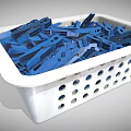 White Plastic Basket Filled With Blue Clothespins For Household Use
