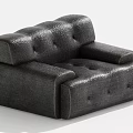 Black Modern Tufted Single Seater Sofa With Textured Upholstery And Armrests