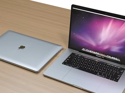 Two Silver Laptops One Open With Colorful Screen And Black Keyboard 3d model