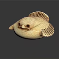 Flying Animal With Round Cream Colored Body And Dark Patterned Wings On Black Background