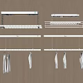 White Wall Mounted Drying Racks On Wooden Wall With Hanging Clothes 3d model