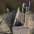 Ancient Building Ruins With Stone Walls Arched Windows And Grassland Surroundings