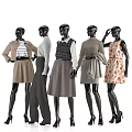 Black Fashion Mannequins Dressed in Various Clothing Outfits with Sweater Skirt and Printed Dress