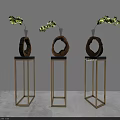 Elegant Wooden Ring Decorations On Golden Stands With Yellow Flower Branches
