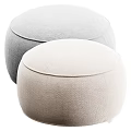 Two Beige Round Fabric Ottomans with Soft Surface for Modern Minimalist Home Decor