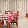 Dining Table With Red And White Checkered Tablecloth Wooden Chairs And Wood Grain Wall