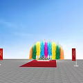 Colorful Fountain Launch Device With Flower Display And People Silhouettes Under Blue Sky