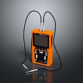Orange Digital Testing Device With Two Connected Probes Display And Control Buttons 3d model