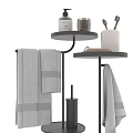 Bathroom Accessories with Black Tiered Stands Gray Towels and Toiletries