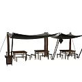 Outdoor Relaxation Space With Green Grass White Canopies Wooden Lounge Chairs And Tables