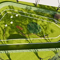 Park Landscape Featuring Green Lawn Curved White Pathways Trees and Wooden Bench