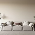Beige Sofa Set with Plush Pillows Floor Lamp and Side Table Potted Plant
