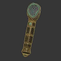 Ornate Golden Decorative Scepter With Green Gemstone Top And Textured Surface