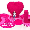 Vibrant Pink Crush Display With Heart Shape I U Plush Decorations And Person