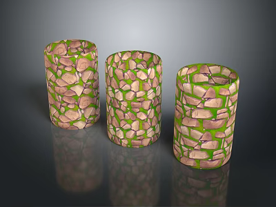 Three Cylindrical Decorative Pieces With Stone-like Patterns And Green Accents 3d model