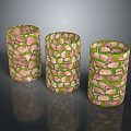 Three Cylindrical Decorative Pieces With Stone-like Patterns And Green Accents