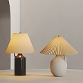 Black And White Vase Base Table Lamps With Fabric And Pleated Shades On Light Table