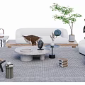 Modern Living Room White Sofa With Round Stone Coffee Table Green Plant And Decorative Items