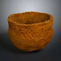Hand Carved Clay Pot Sculpture With Textured Surface And Holes Design