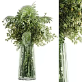 Fresh Green Floral Arrangement In Glass Vase With Fern Leaves And Foliage