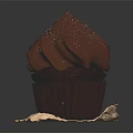 Rich Chocolate Cupcake With Swirled Frosting Dusted On Parchment Paper Background