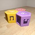 Hexagonal Stools With Colorful Cutout Designs Yellow Pink Purple Musical Note Smiley On Wooden Floor
