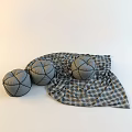 Three Soft Gray Round Ottoman Cushions With Plaid Fabric Cover Design