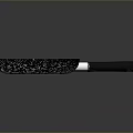 Black Frying Pan With White Speckles And Black Handle For Daily Kitchen Use
