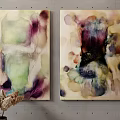 Abstract Watercolor Paintings On Gray Wall With Vase And Decorative Items