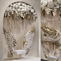 Wall Decorative Design With Arch White Flowers And Golden Wings Hanging Ornaments