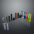 Assorted Colored Cylindrical Objects Including Striped And Solid Designs On