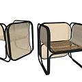 Modern Rattan Leisure Chair With Black Metal Frame And Comfortable Seating Design
