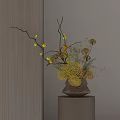 Dark Brown Ceramic Vase With Yellow Flowers And Decorative Branches On Wooden Base