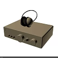 Gold Colored Headphones Placed On Classic Audio Device With Control Knobs And Sleek Design