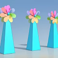 Three Colorful Petal Shaped Architectural Components With Blue Conical Bases