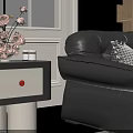Black Leather Loveseat With Decorative Pillows And Brown Blanket In Cozy Living Room Snowy View