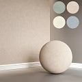 Colorful Circular Components Including Beige Sphere and Four Different Colored Discs on Beige Gray Walls