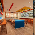 Vibrant Modern Restaurant Interior With Orange Chairs Blue Counter Wooden Floors And Wall Decorations
