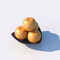 Four Fresh Ripe Oranges Arranged on Black Plate Against White Background