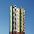 Modern High Rise Residential Building Exterior With Numerous Windows And Blue Sky Background