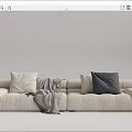 Modern Beige Sectional Sofa With Multiple Cushions Gray Accent Cushion And Fringed Blanket