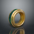 Unique Fashionable Gold Ring With Green Inlay And Intricate Decorative Patterns