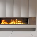 Modern Fireplace With Burning Flame In Contemporary Interior With White Cabinetry And Decorative Sculpture