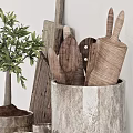 Rustic Kitchenware With Wooden Utensils Cutting Boards And Plant