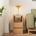Wooden Coffee Table With Green Sofa Yellow Lamp White Cup And Shelves With Books Basket