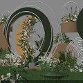 Outdoor Photo Check In Spot With Green Grass And Circular Ring Flower Decorations