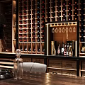 Modern Open Wine Cellar Interior With Wooden Wine Racks And Display Shelves