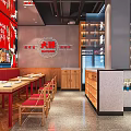 Chinese Restaurant Interior With Red Walls Long Wooden Tables Red Chairs And Wine Bottles