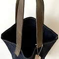 Stylish Dark Blue Canvas Tote Bag Pendant with Leather Handles and Manufacturer Text Label
