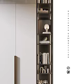 Modern Storage Cabinet With White Panels Gold Handles And Adjacent Bookshelf With Books Decorative Items